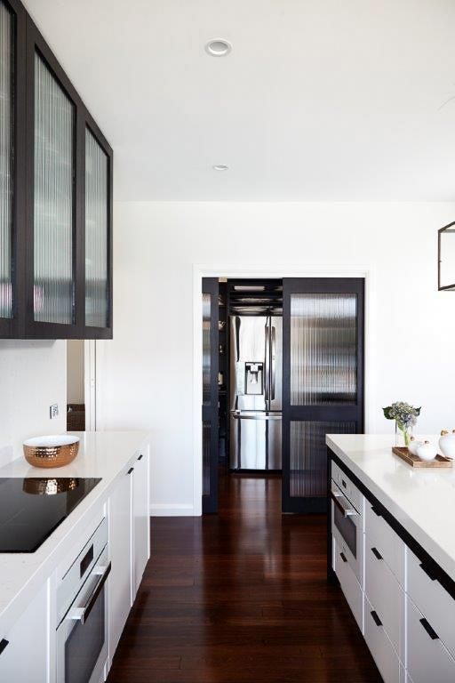 A Kitchen With White Cabinets And Stainless Steel Appliances — Viison Kitchens & Joinery Forster In Old Bar, NSW