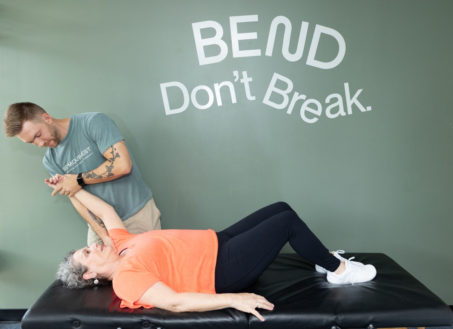  Patient working with a provider at a physical therapy clinic in Henrico, VA during a one-on-one spo