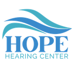 The logo for louisville family audiology is a blue and green infinity symbol.