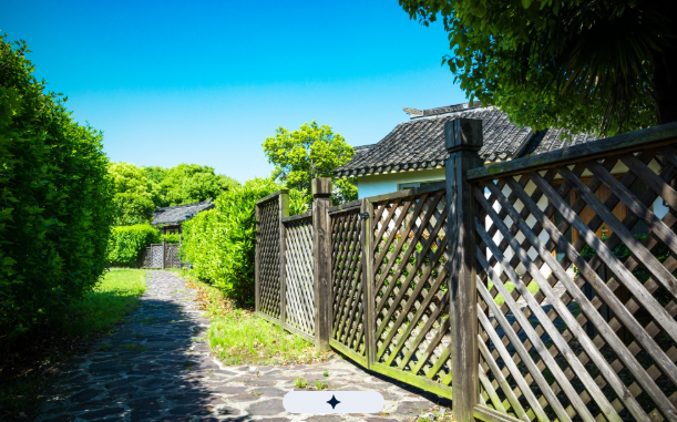 Beautiful cedar wood fence installed around a residential property in Fresno, CA with professional c