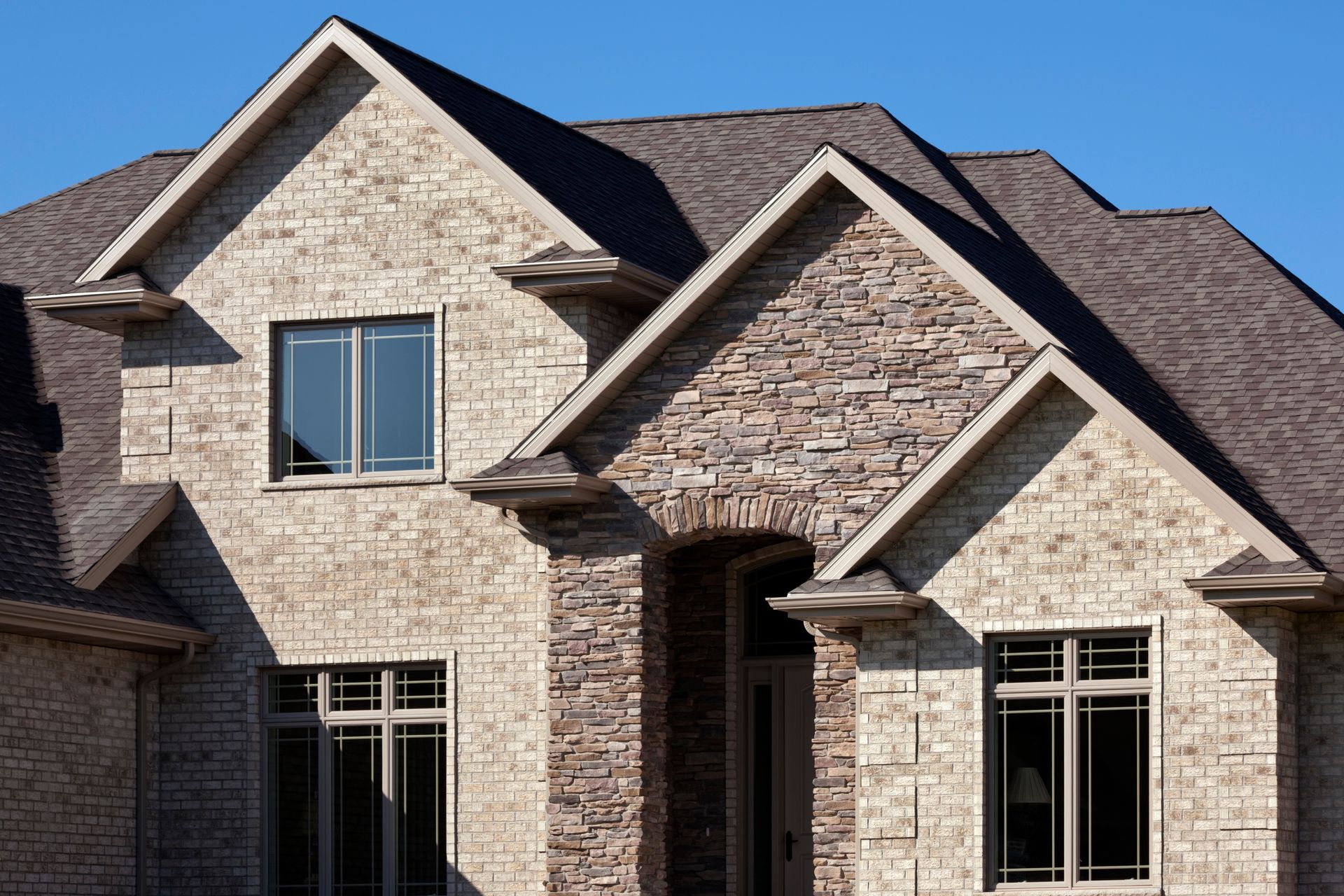 Houses with gray roof — Mount Wolf, PA — Dover Roofing Services