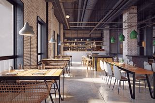 Empty modern cafe interior with brick walls, long tables, pendant lights, and sunlight streaming in