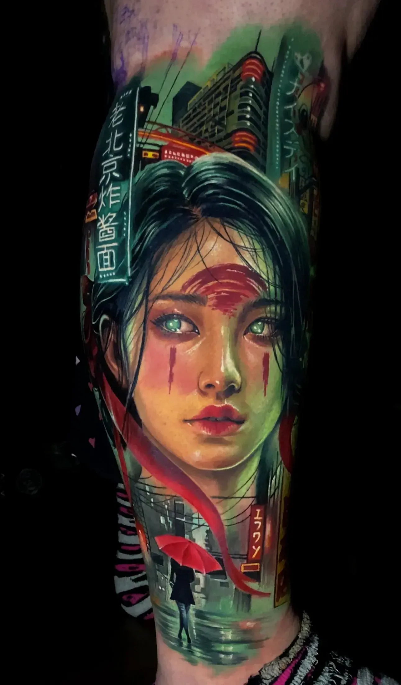 A detailed tattoo of a face with glowing eyes, integrated into a cyberpunk cityscape with neon lights and a red umbrella.