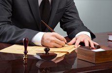 solicitor signing papers