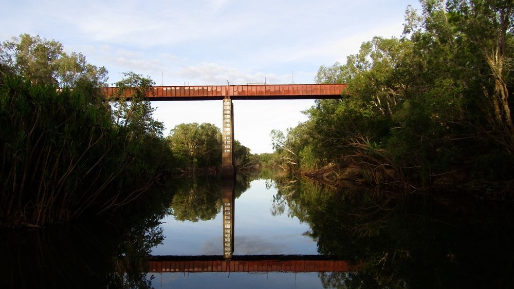 A Bridge Over A River With Trees — Fewmore Contracting in Katherine, NT