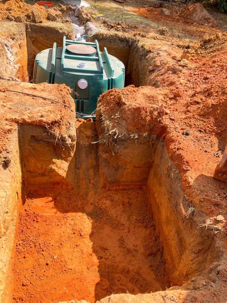 A Septic Tank is Being Installed in a Hole in the Ground — Fewmore Contracting in Humpty Doo, NT