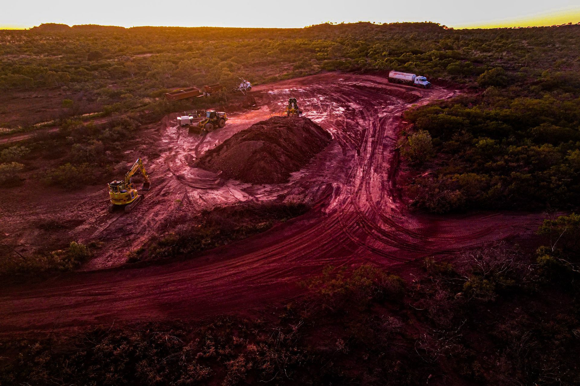 An Aerial View of a Dirt Road and a Pile of Dirt — Fewmore Contracting in Palmerston, NT