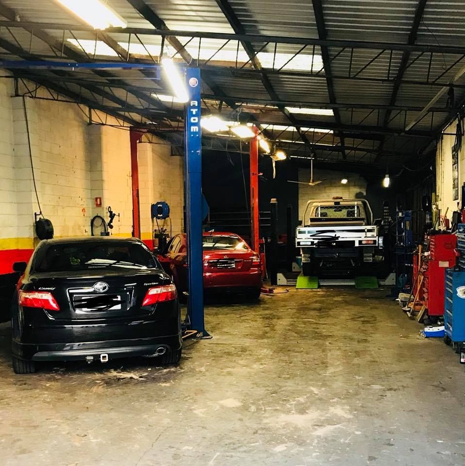 Car is Sitting on a Lift in a Garage — Sebring All Mechanical Repairs In Mermaid Beach, QLD