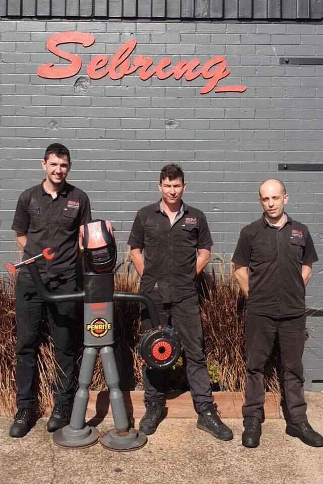 Three Men Are Standing Next To Each Other β Sebring All Mechanical Repairs In Mermaid Beach, QLD