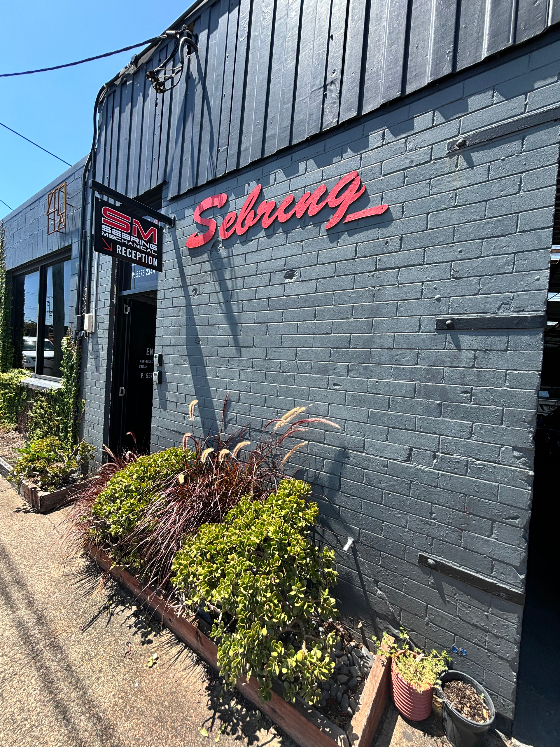 The Front Of A Mechanical Workshop With A Sign β Sebring All Mechanical Repairs In Mermaid Beach, QLD