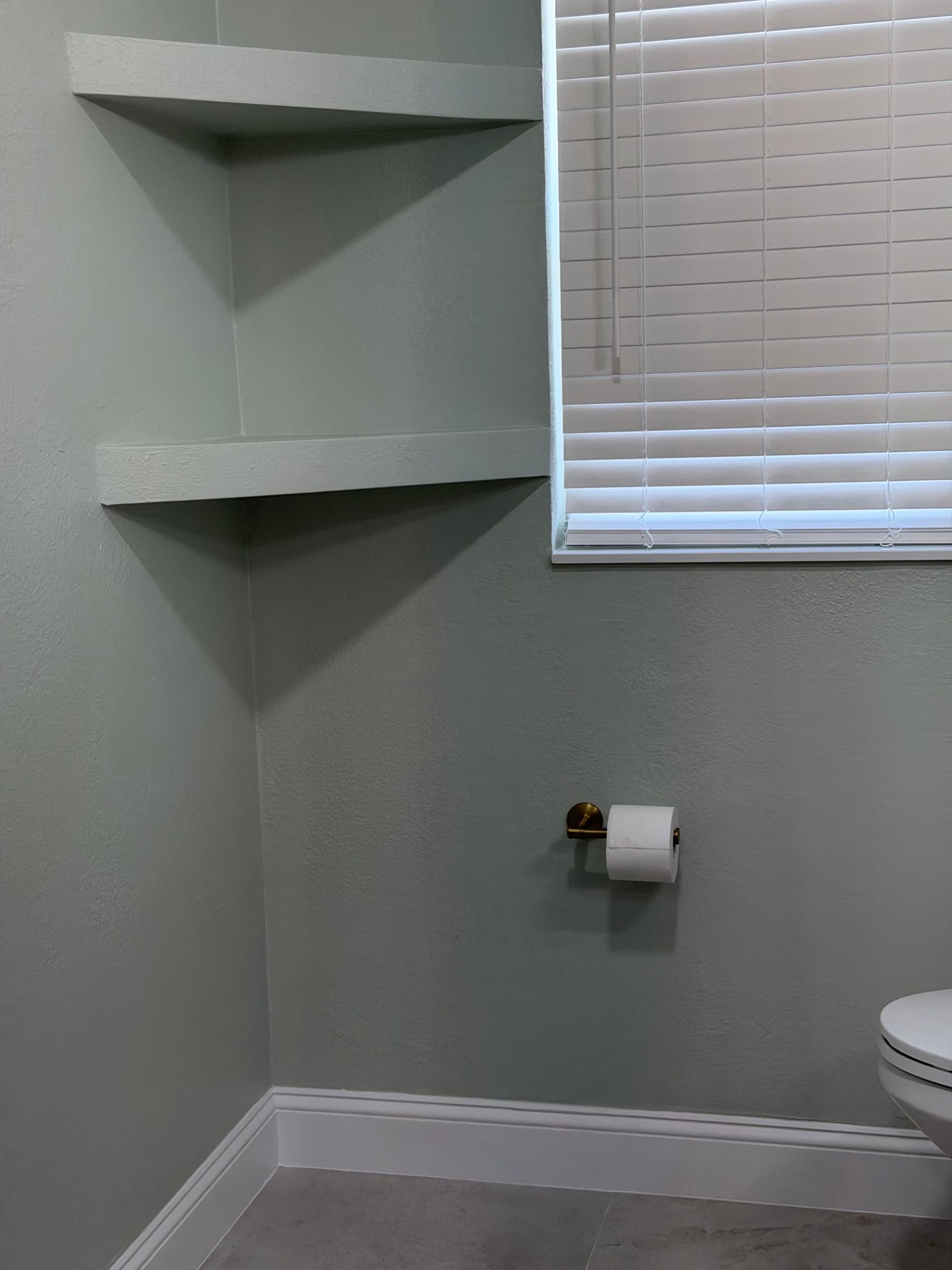 dual built in drywall shelves, pain matched to the wall in swfl Fort Myers Naples