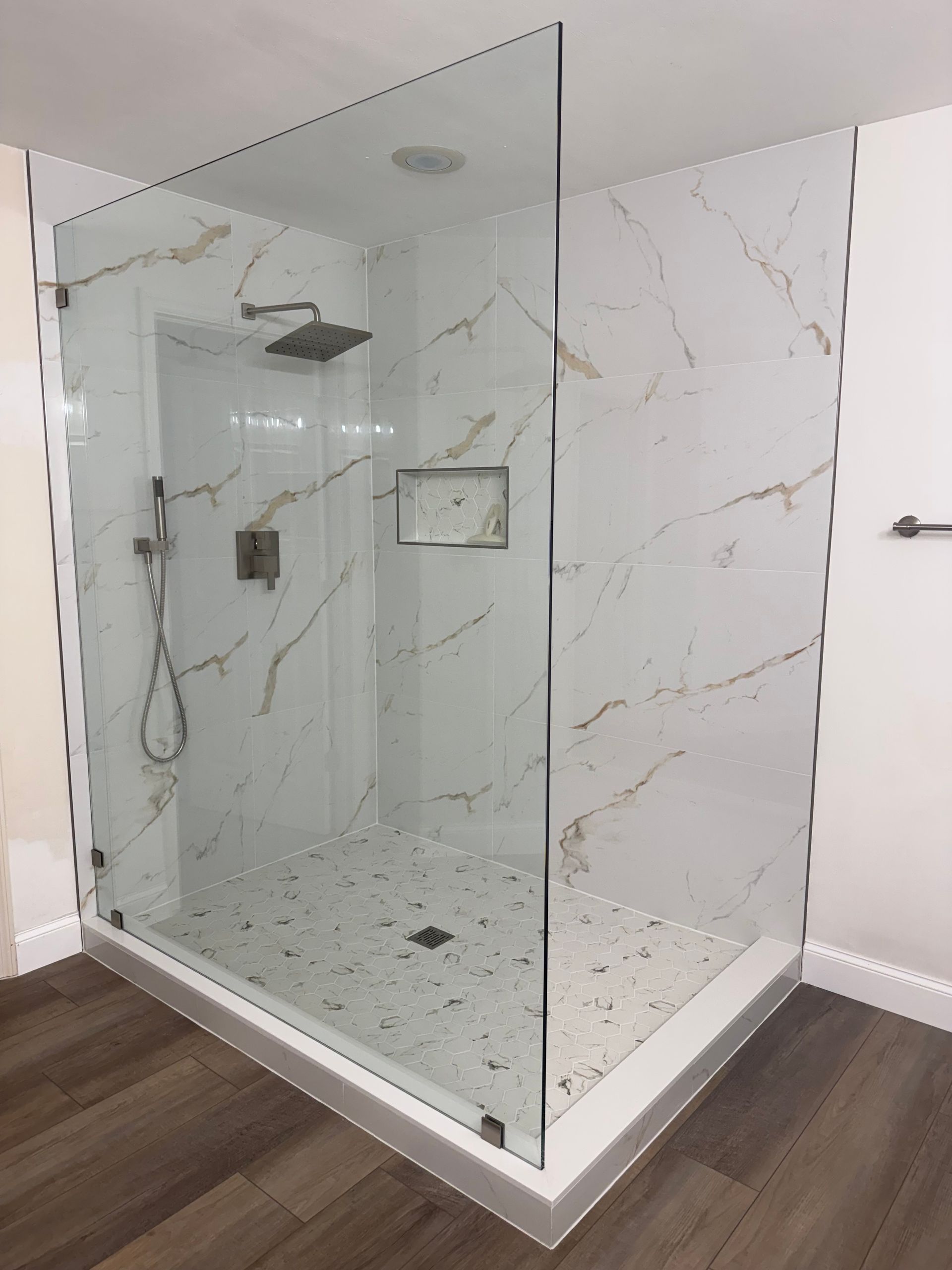 A bathroom with a shower
