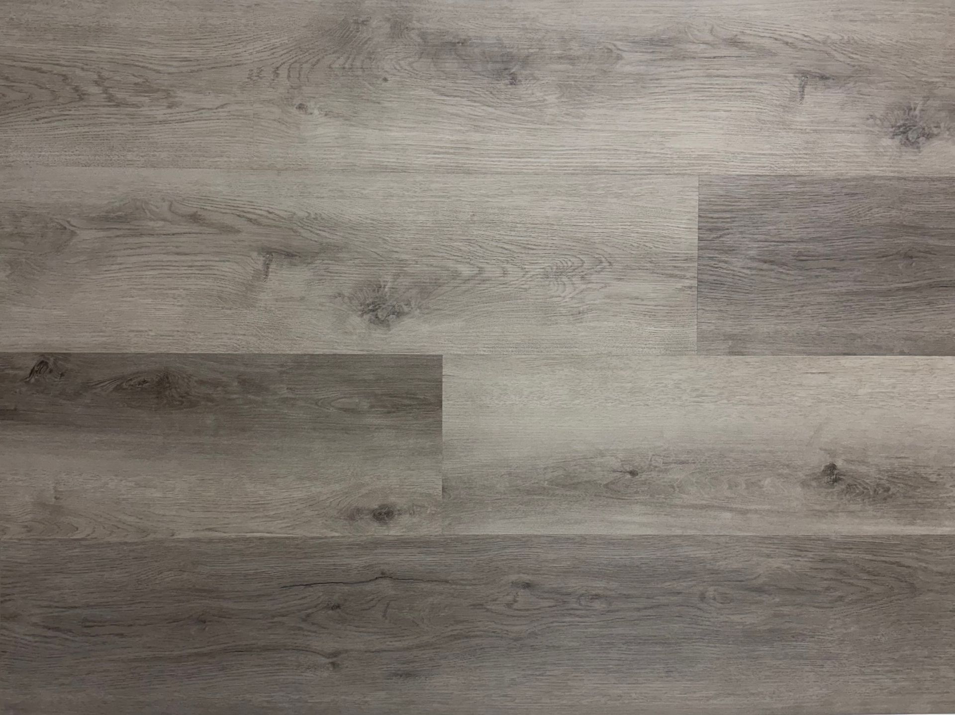 A close up of a gray wooden floor.