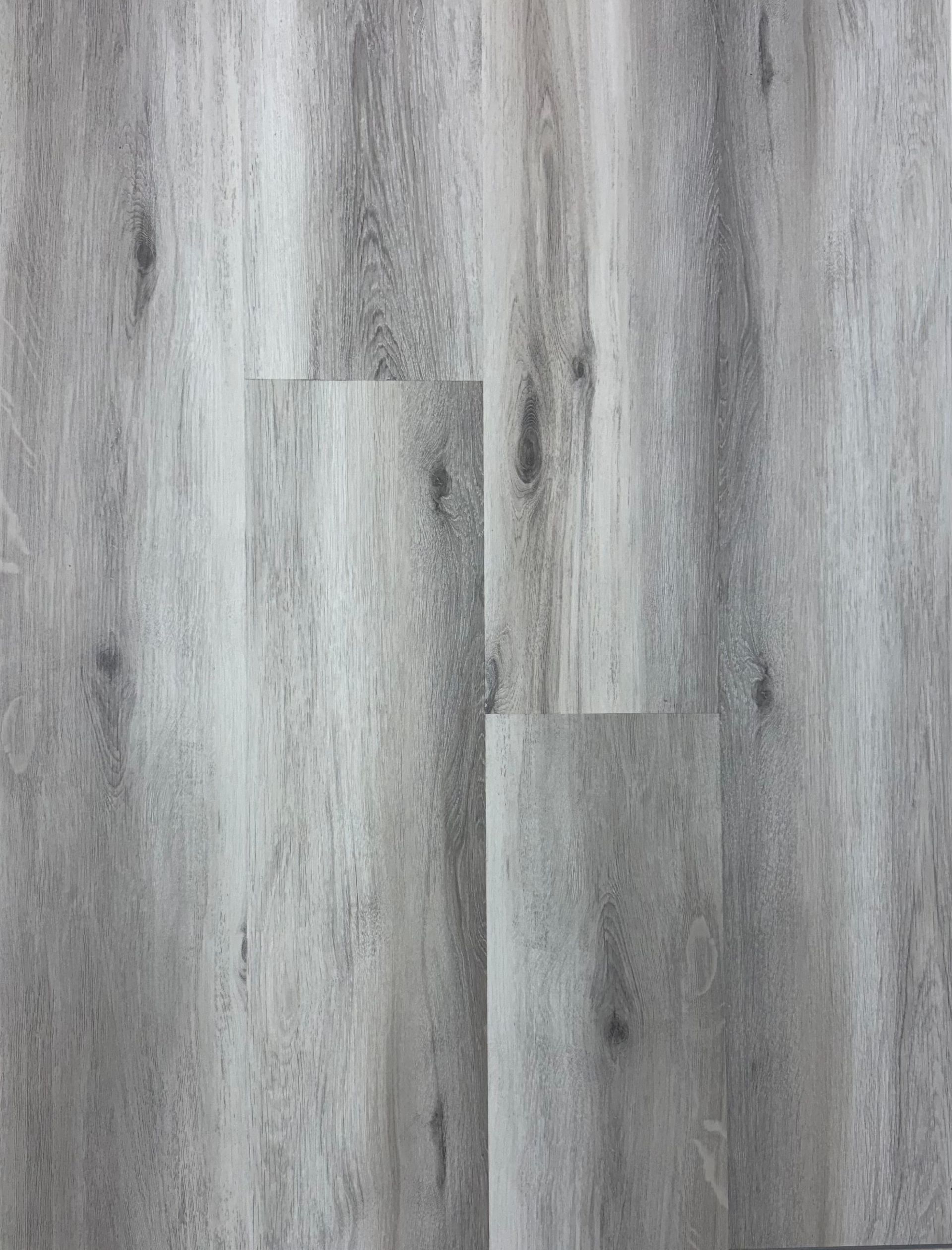 A close up of a gray wooden floor.