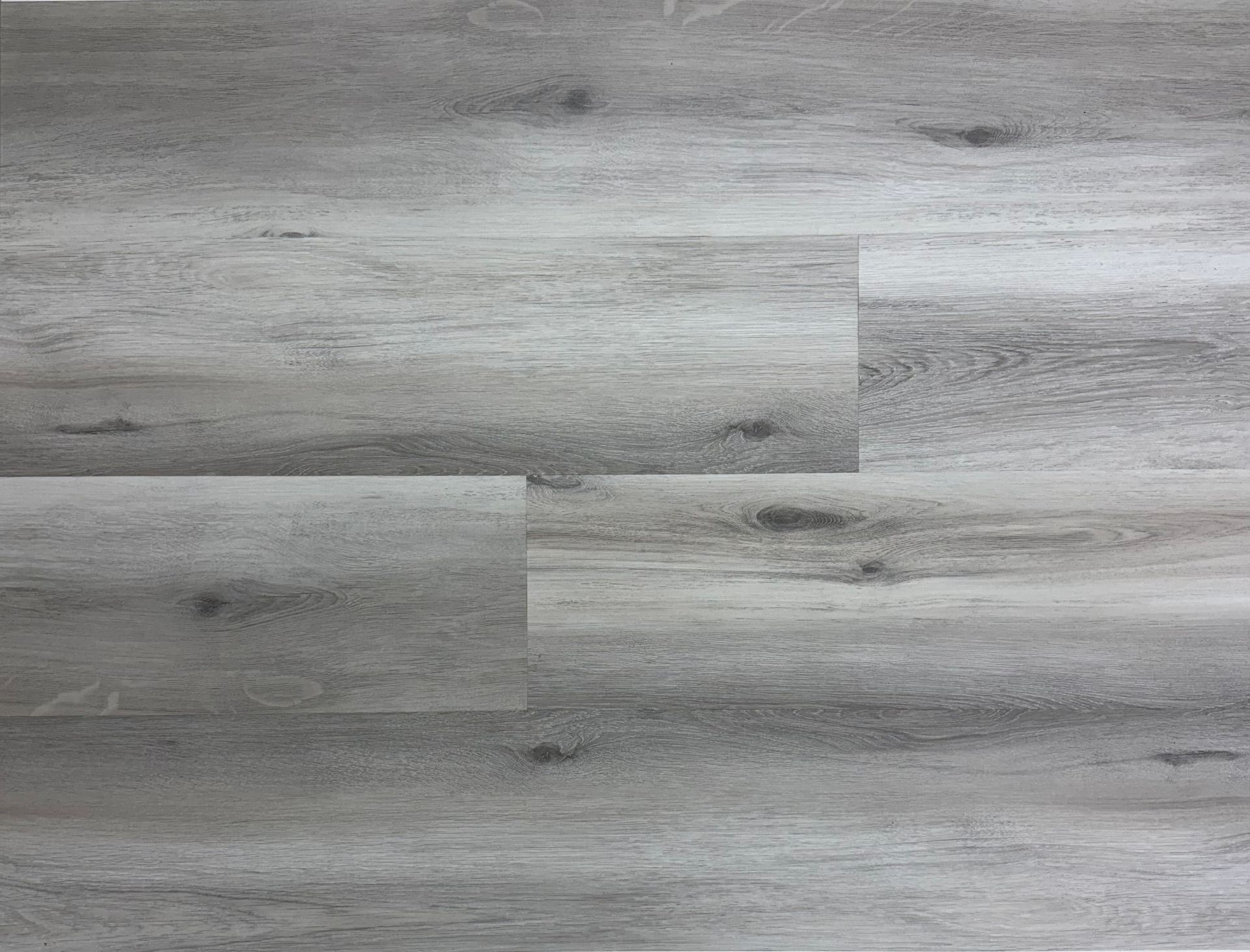 A close up of a gray wooden floor.