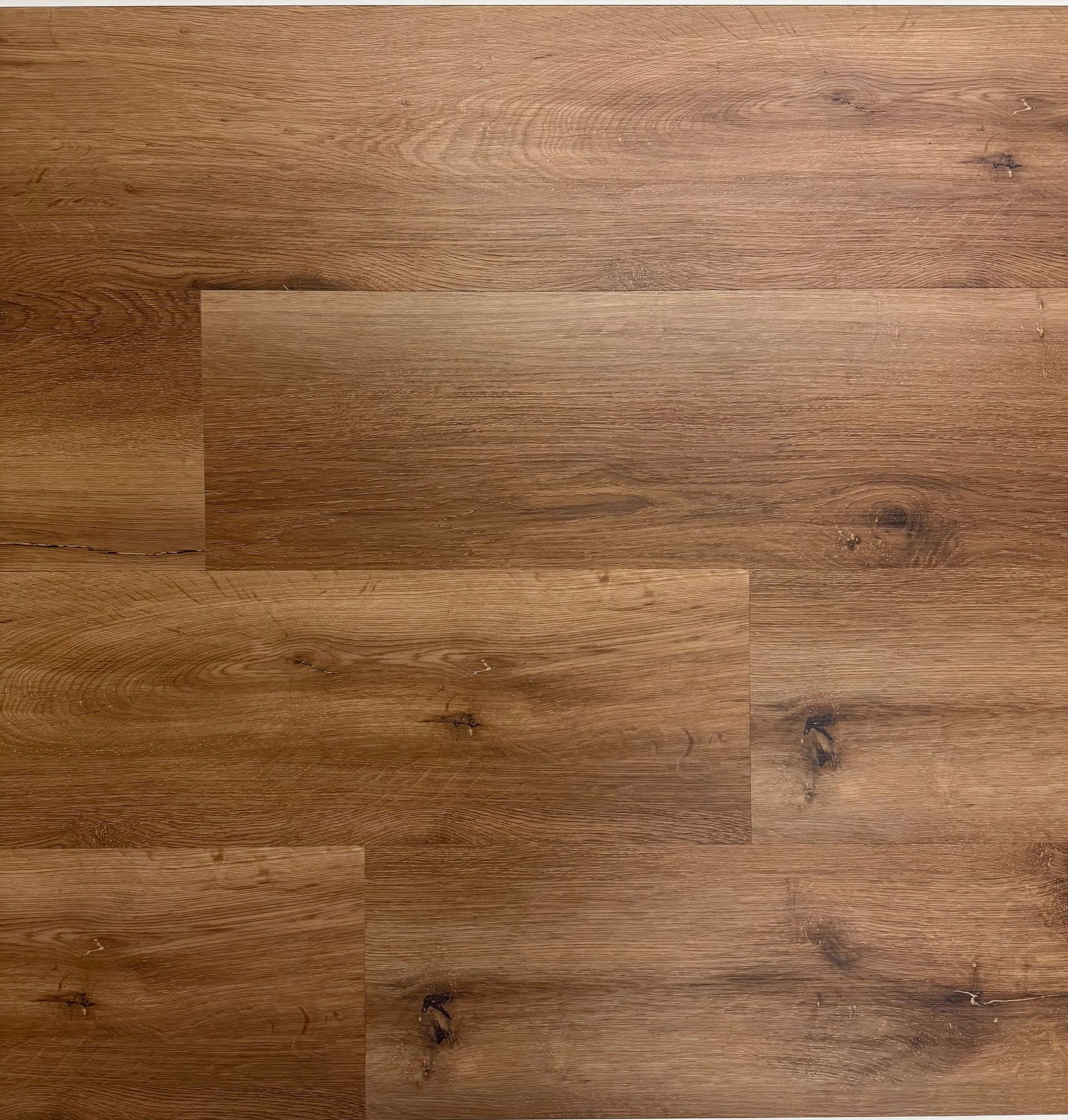 A close up of a wooden floor on a white background.