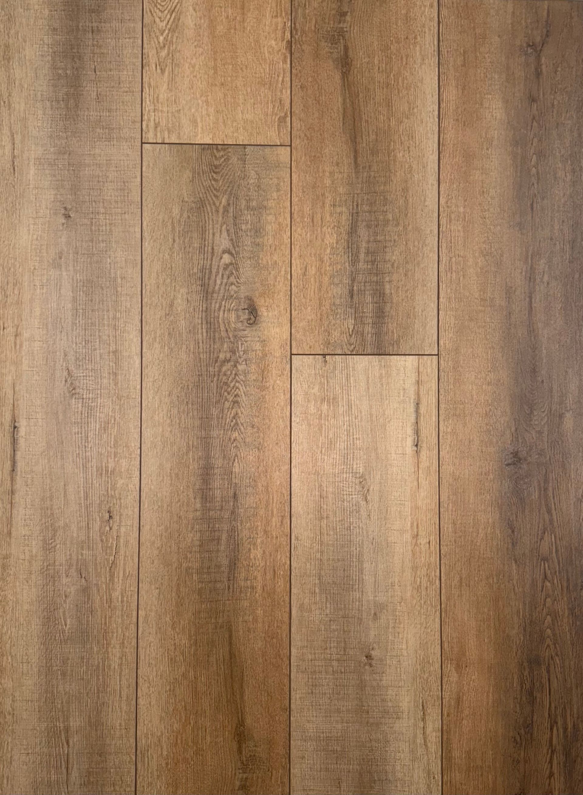 A close up of a wooden floor with a grainy texture.