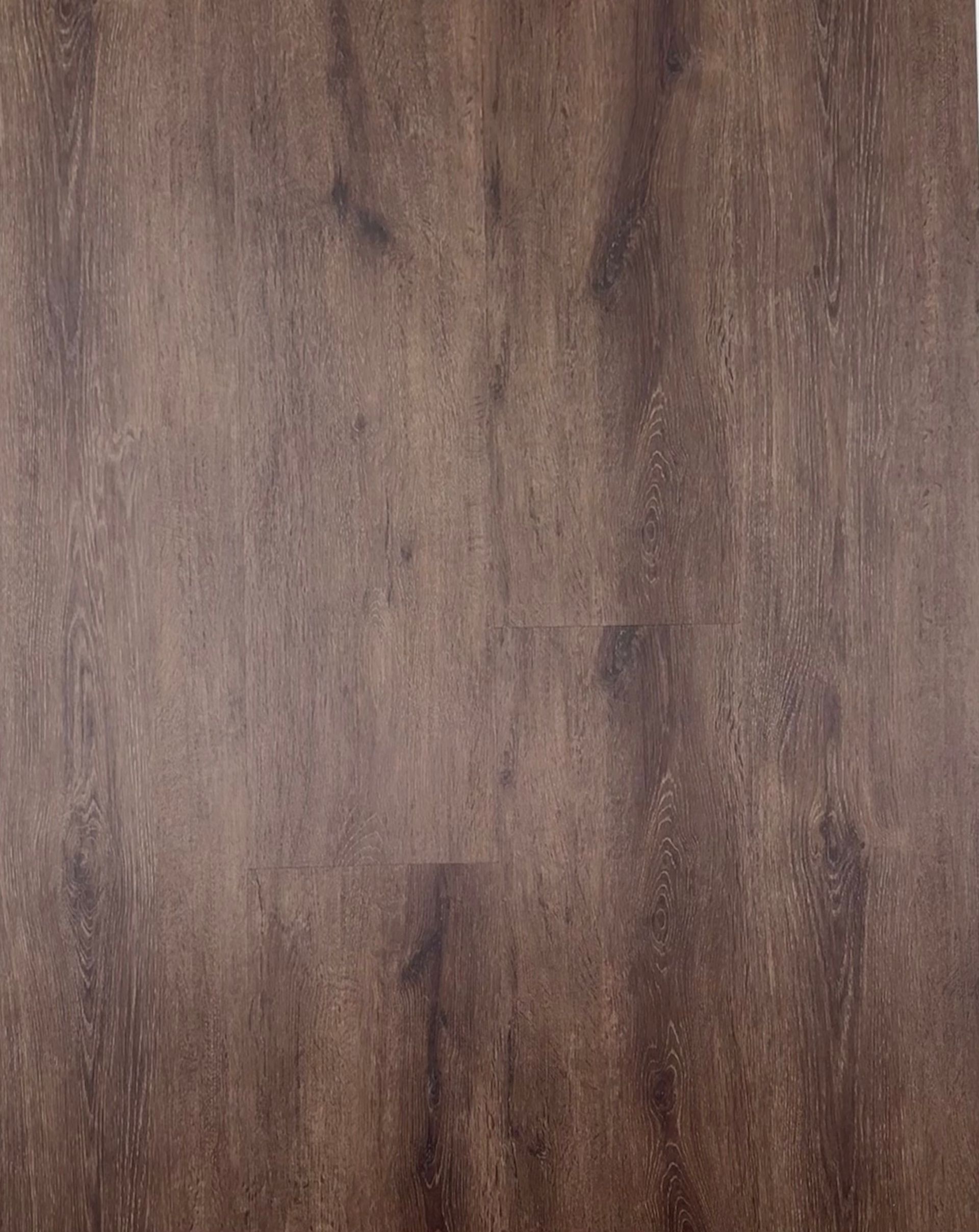 A close up of a brown wooden floor.
