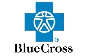 The blue cross logo is a blue cross with a white star in the middle.