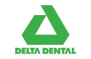 A green delta dental logo on a white background