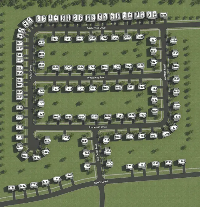 An aerial view of a residential area with lots of houses and trees
