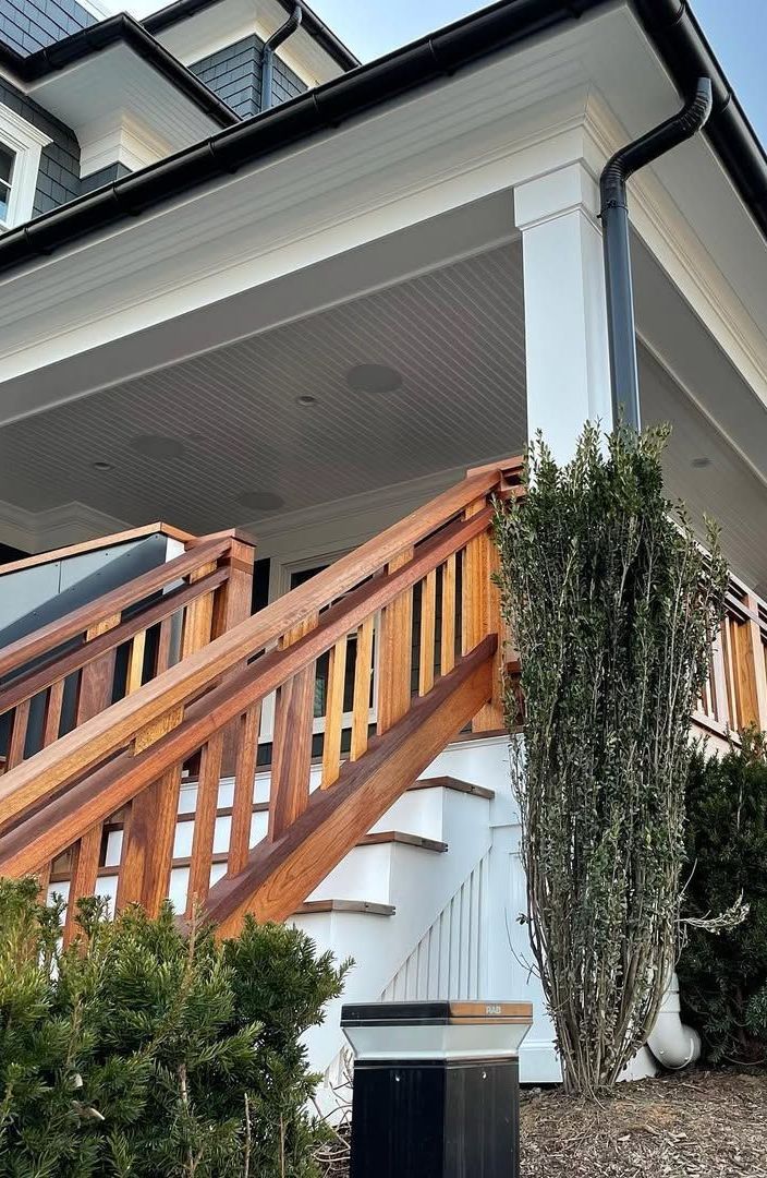 A house with a wooden porch and stairs
