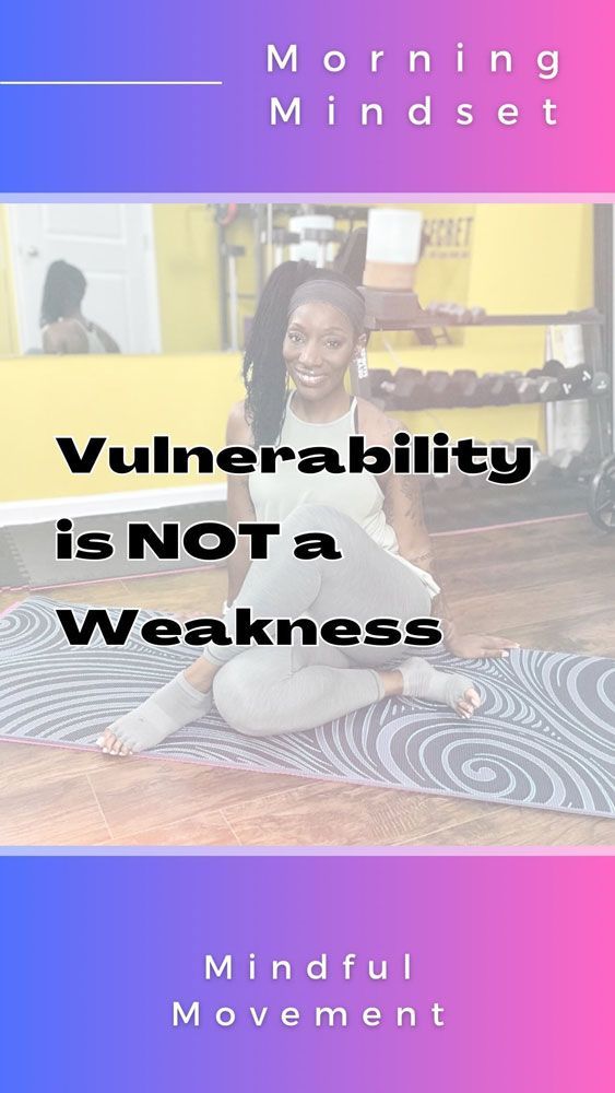 A woman is kneeling on a yoga mat.