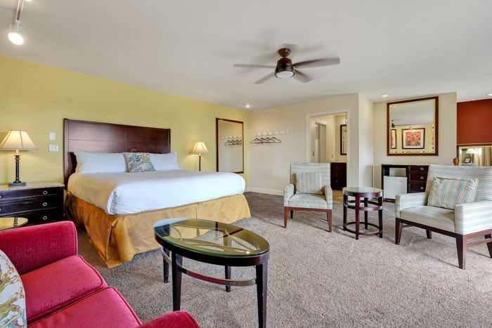 There is a king size bed in the middle of the room.