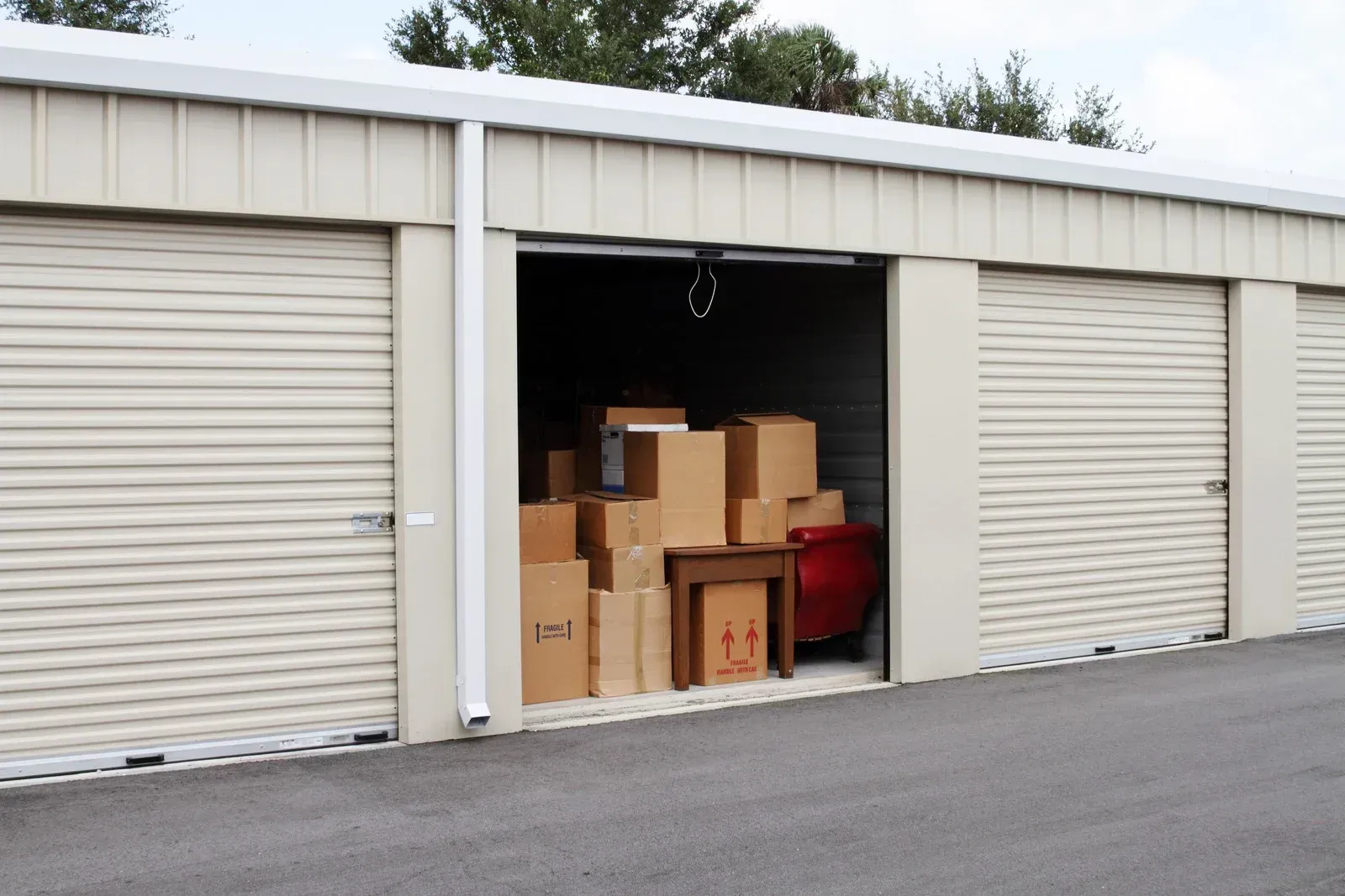 A storage unit with a lot of boxes in it