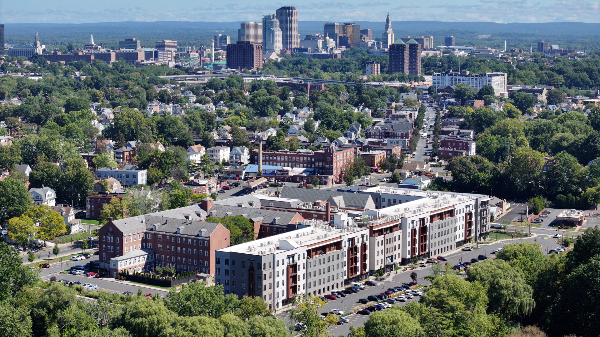 Aerial view of One Park apartments in West Hartford showcasing Sisters of st. joseph convent and surrounding west hartford and hartford area