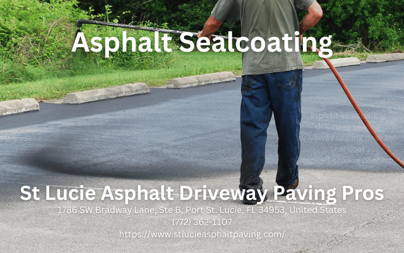 worker leveling fresh asphalt on a road construction