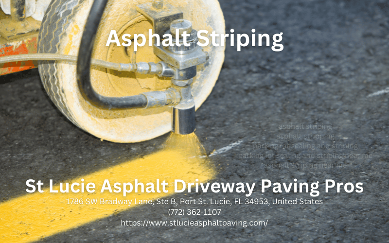 worker leveling fresh asphalt on a road construction