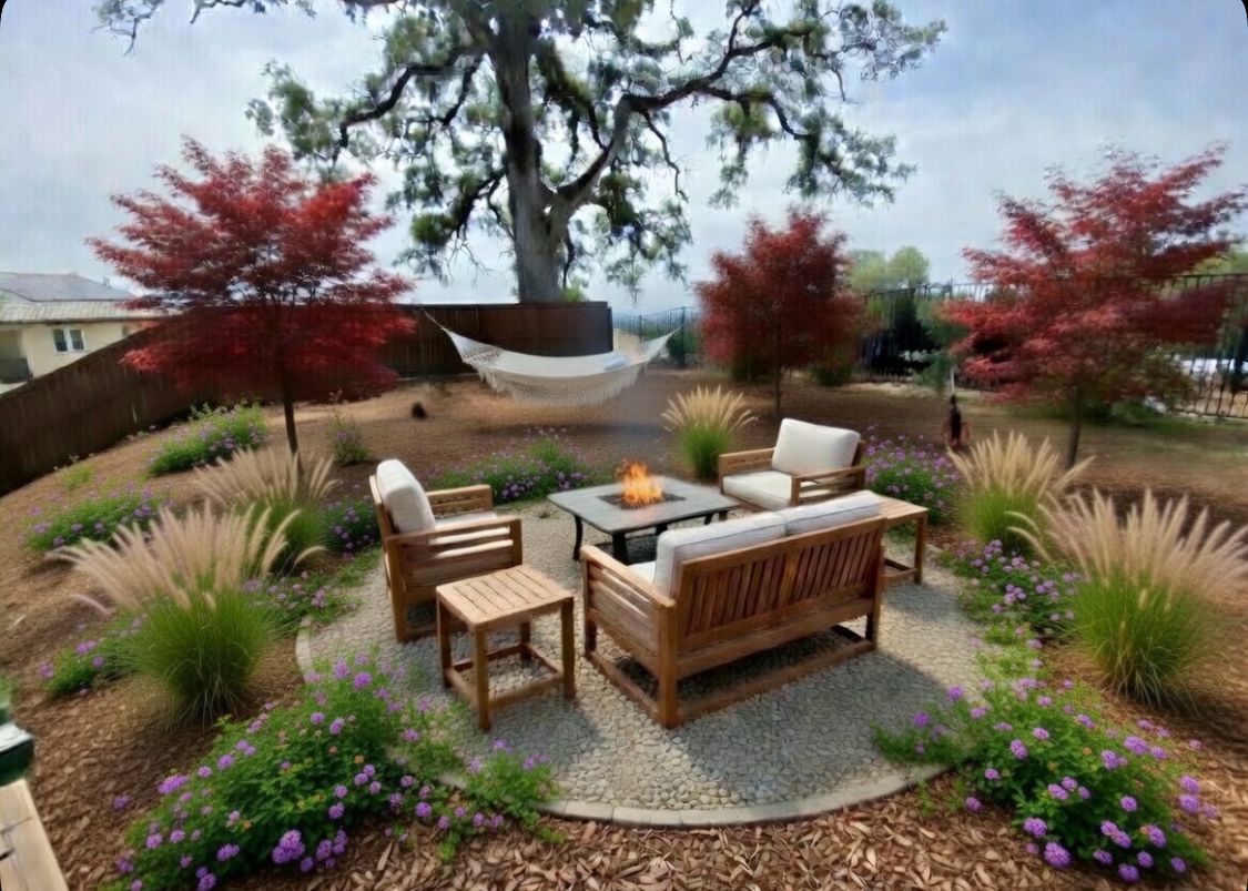 Outdoor patio seating area with wooden chairs, fire pit table, and landscaped garden with red trees