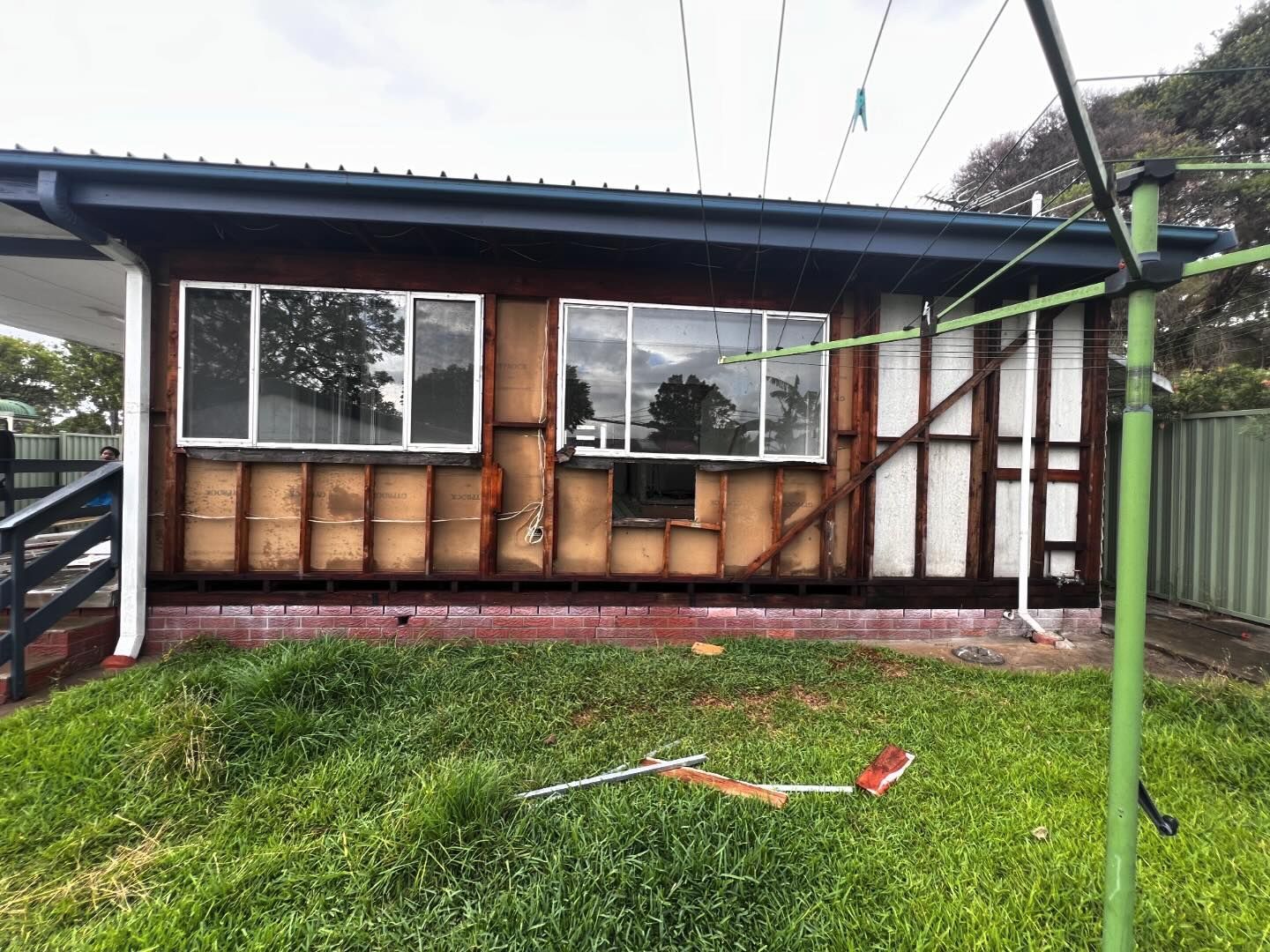 Exterior Wall of a House Undergoing Renovation — Ecowave Solutions Asbestos Removal In Gosford, NSW