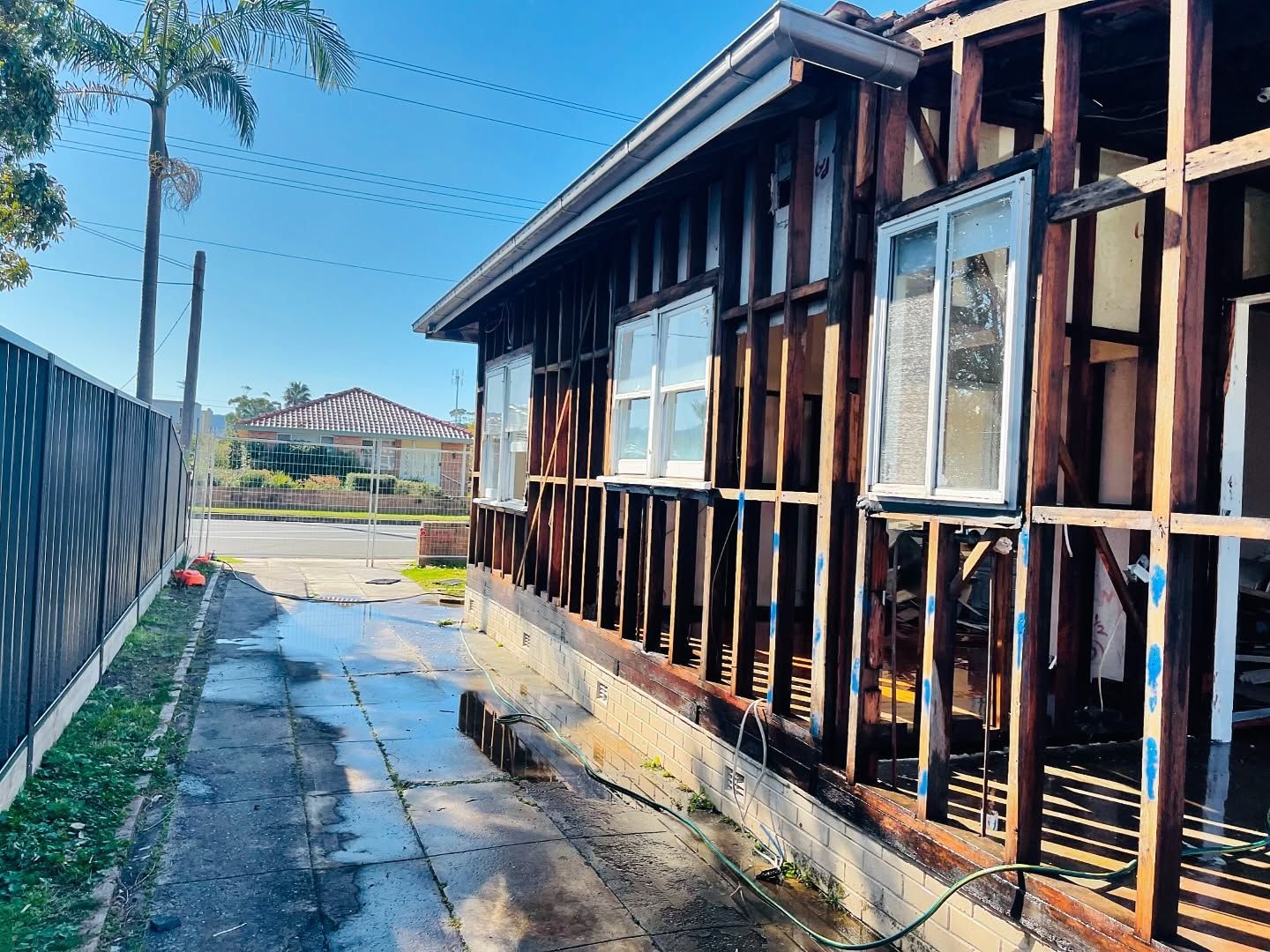 House Exterior Under Renovation; Wood Frame Visible — Ecowave Solutions Asbestos Removal In Gosford, NSW