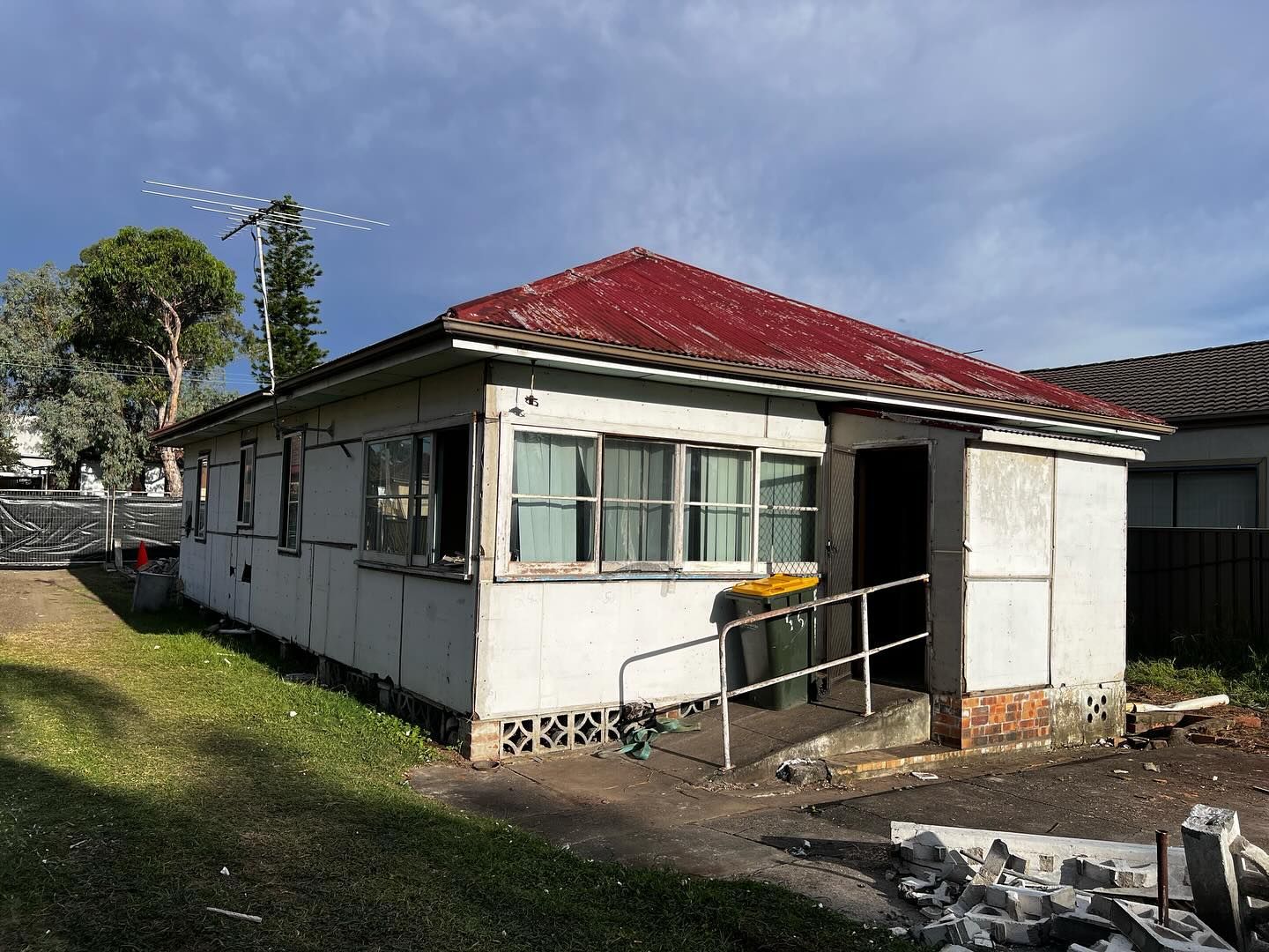 Weathered, Single-story House With a Red Roof — Ecowave Solutions Asbestos Removal In Gosford, NSW