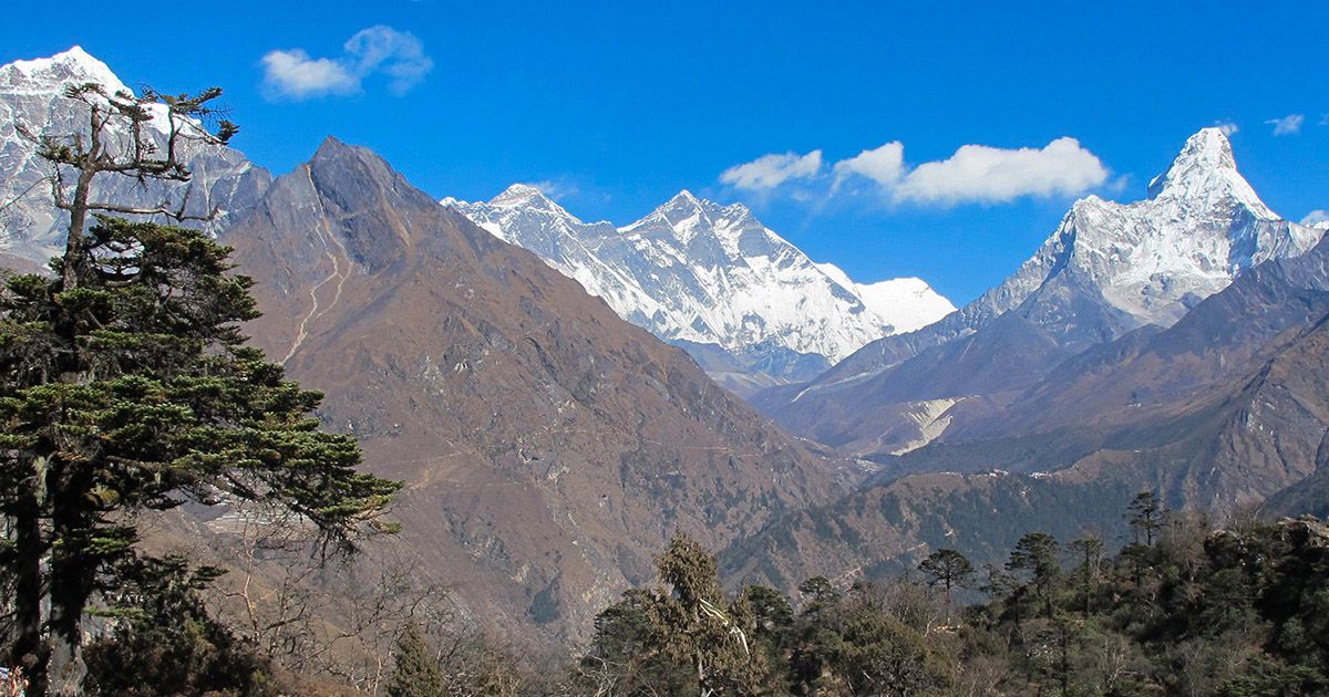 Beautiful trekking viewpoint in Nepal, showcasing snow-capped peaks and panoramic mountain views.