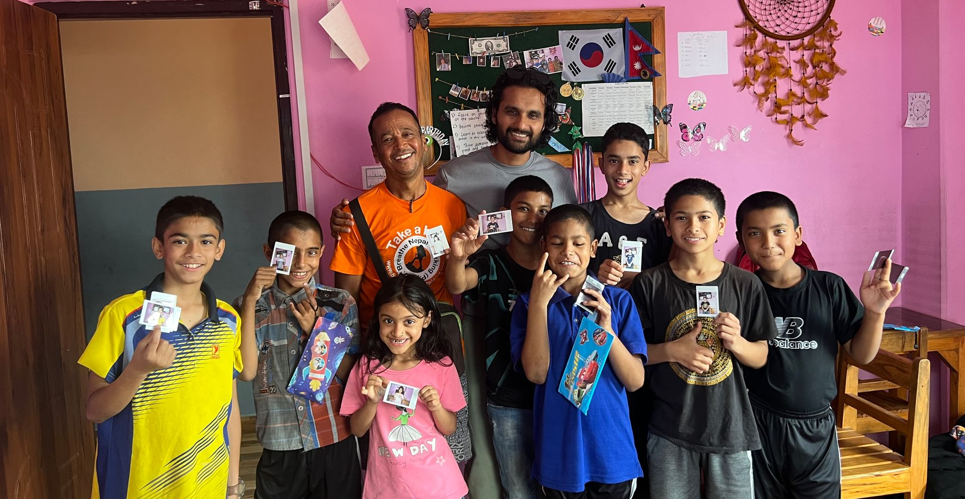 Roman and team visiting children at the Ohhee Khusi Nepal Foundation educational project in Pokhara, Nepal