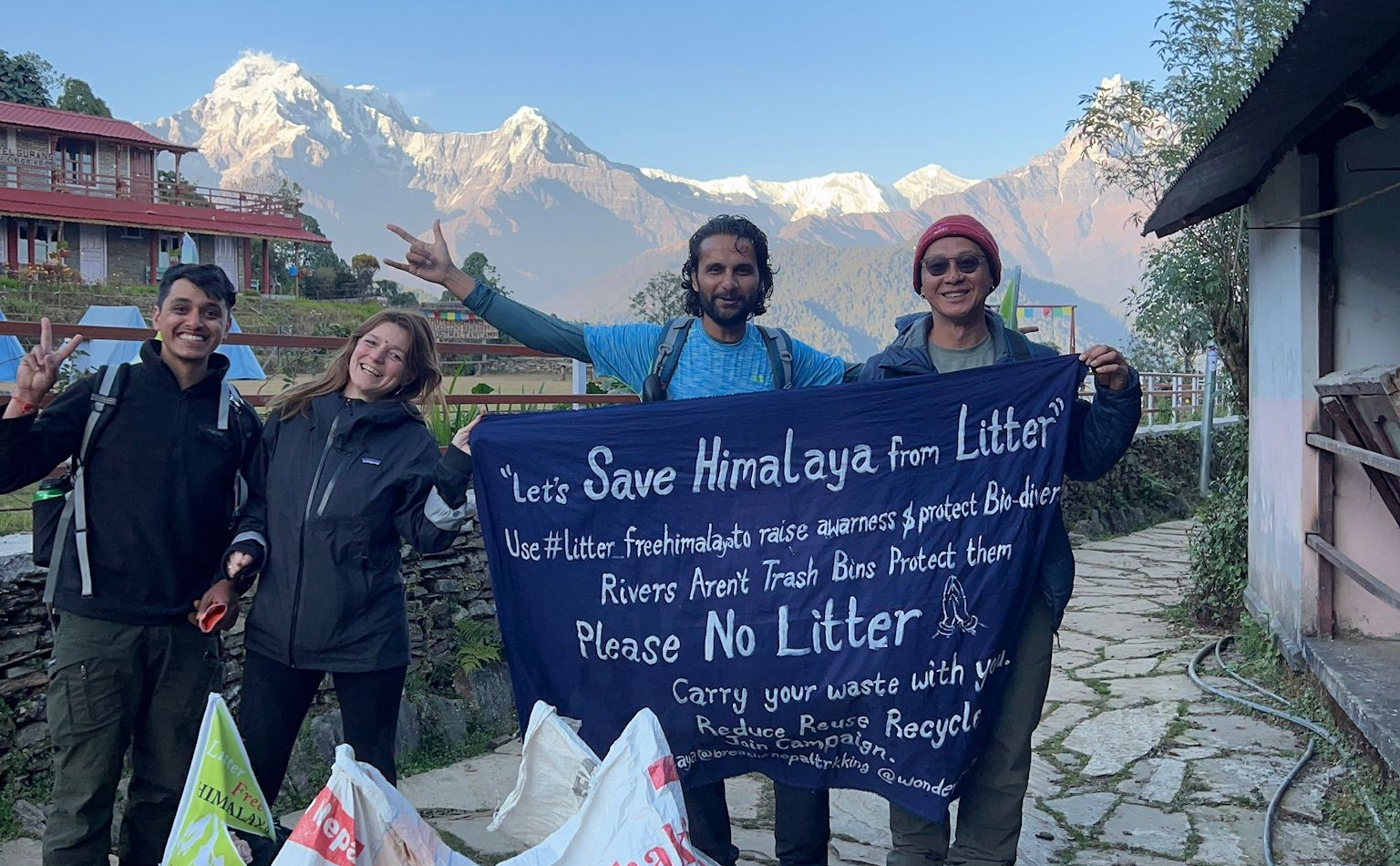 Litter Free Himalaya clean-up campaign on the trail with the Annapurna range in the background, Nepal