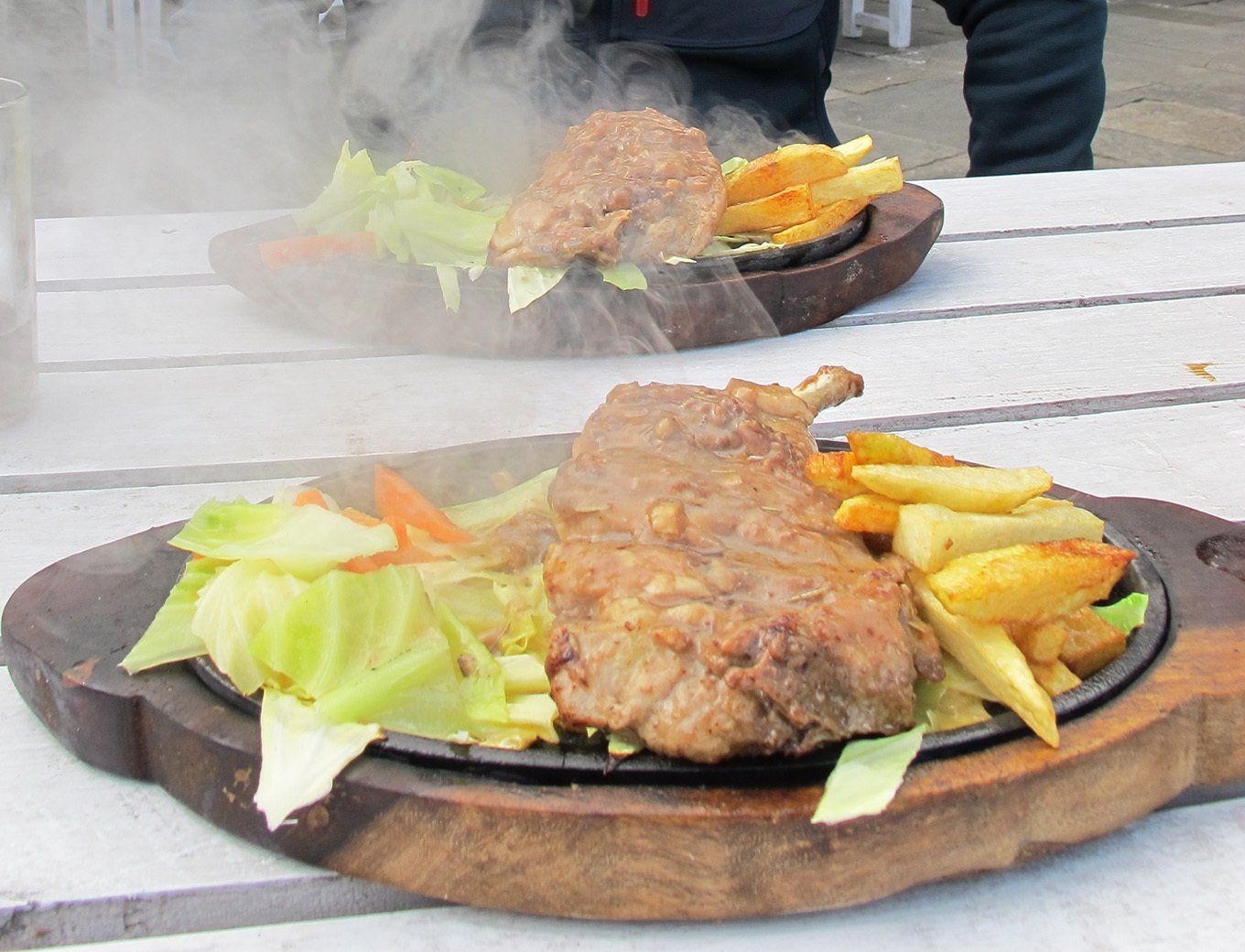Delicious traditional Nepali meal served on the Annapurna Trek, showcasing local cuisine amidst stunning scenery.
