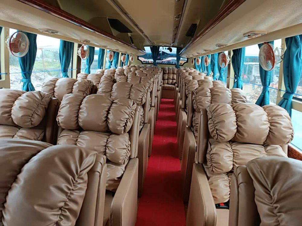 Interior view of a luxury bus, offering comfortable transport for passengers traveling from Kathmandu to Pokhara in Nepal.