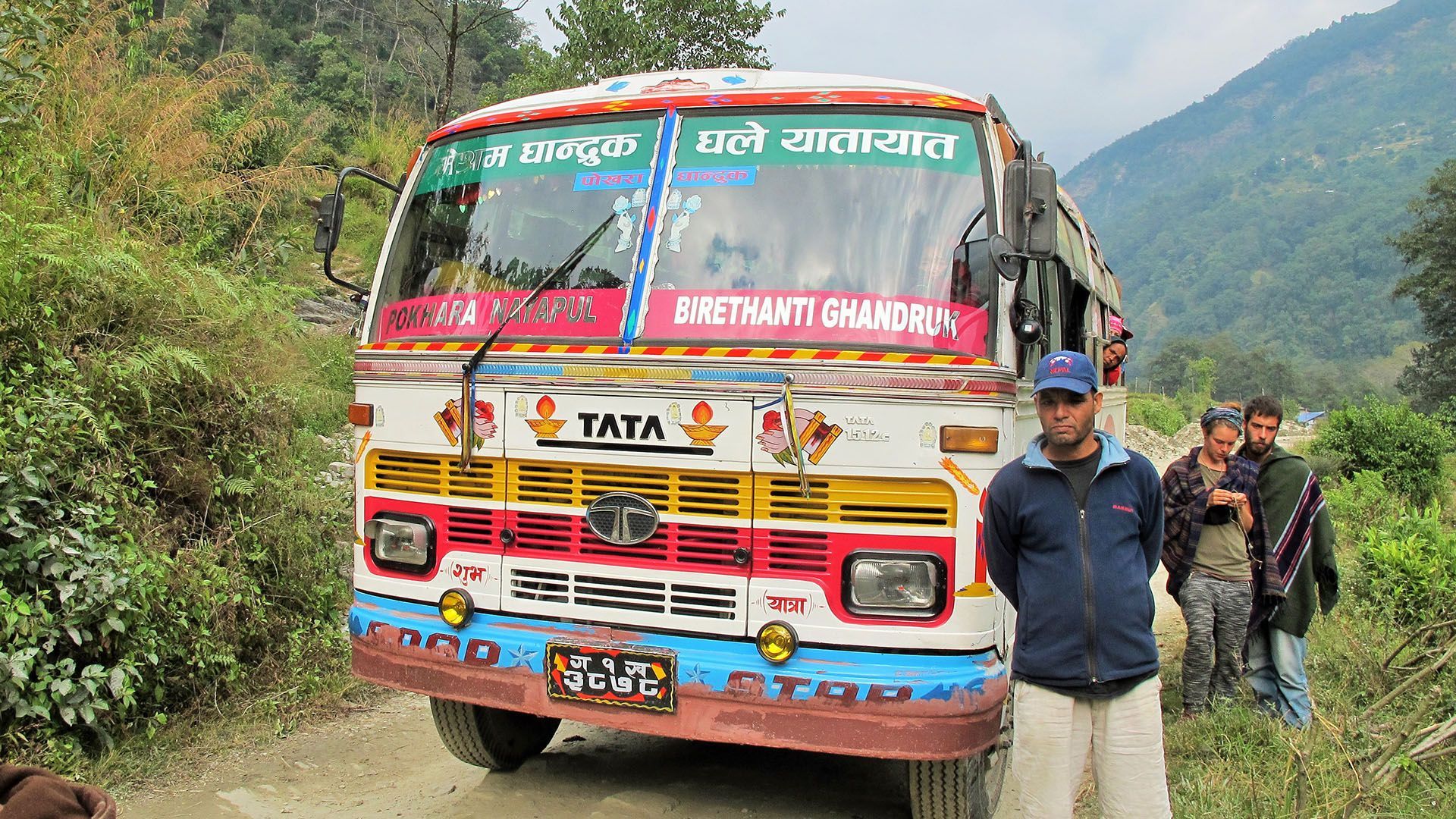 Colorful local bus in Nepal, representing vibrant transport culture and local travel experiences.