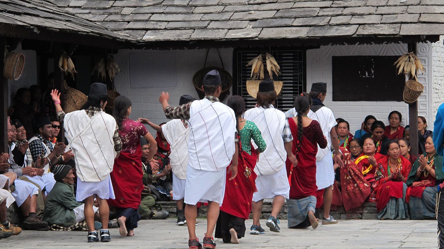 Traditional Gurung cultural dance performed in a village square in the Annapurna region, Nepal