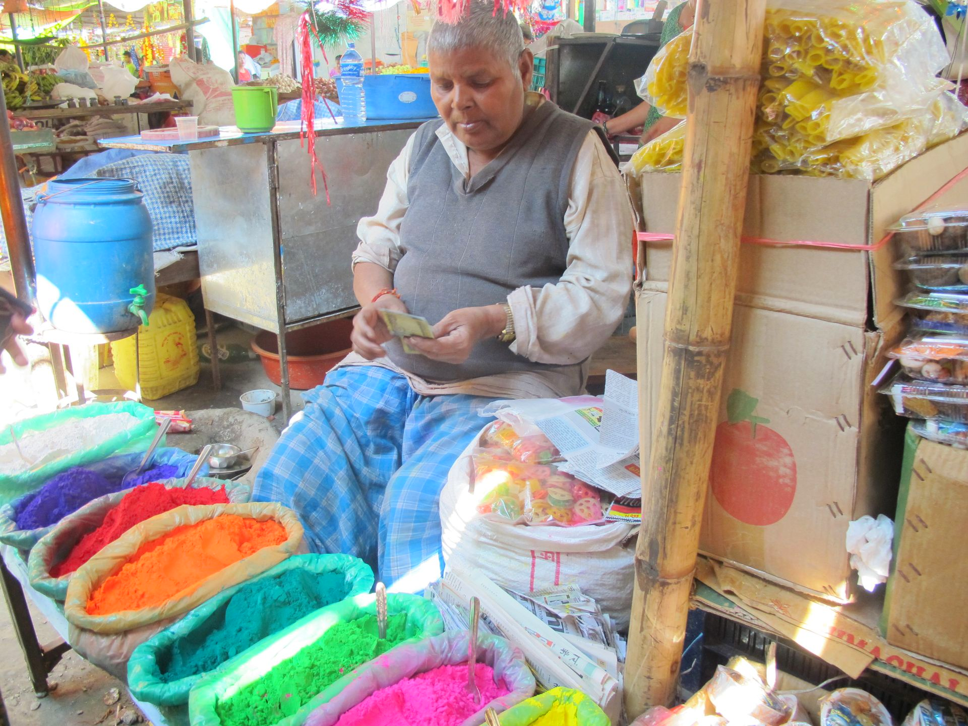 Bowls of coloured powder at a market stall in Nepal