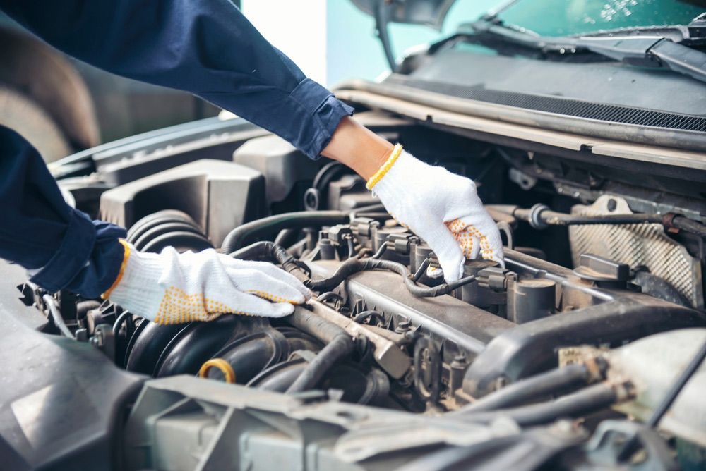 Mechanic Man Hands Repairing Car Auto Repair Shop — Crossway Wreckers & Mechanical In Gordonvale, QLD