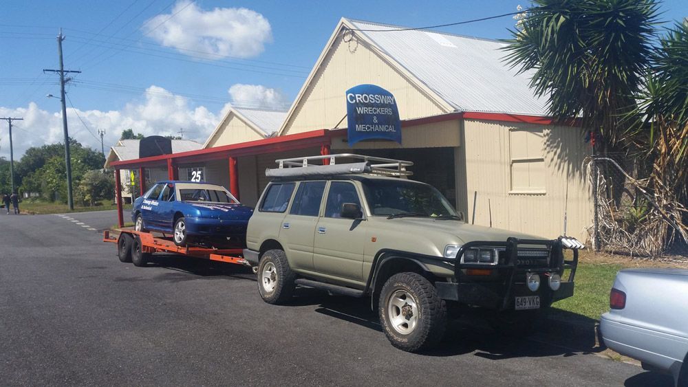 Blue Car Being Towed — Crossway Wreckers & Mechanical In Gordonvale, QLD