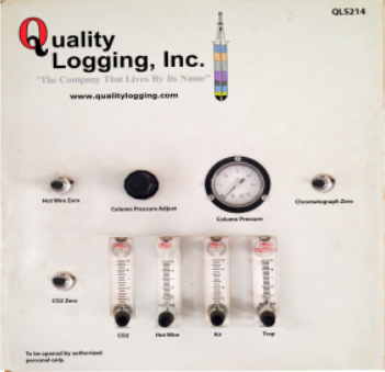 A quality logging inc. sign with a clock on it