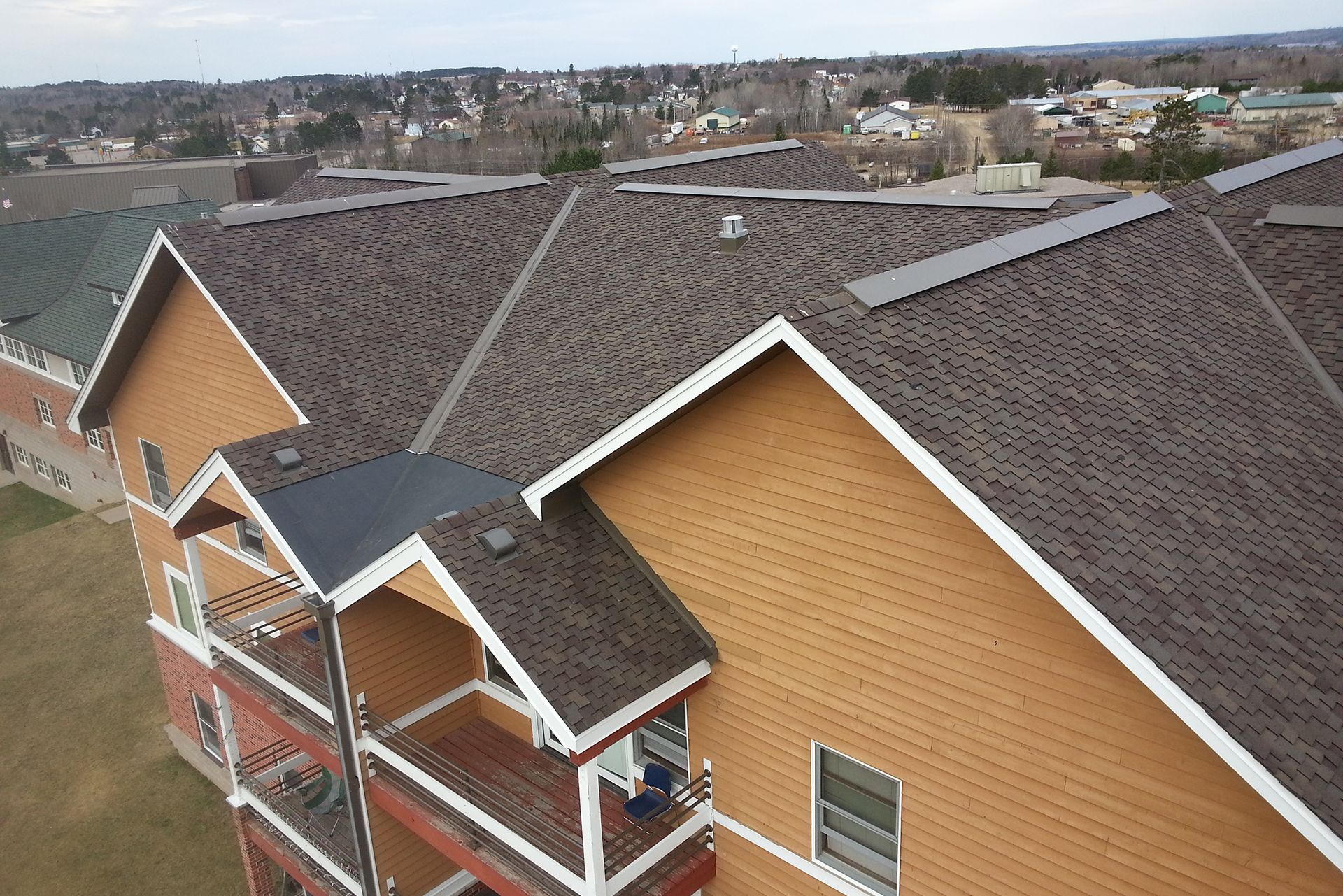 A completed shingle project on the rooftop of the Vermillion Community College Dormitory in Ely, Minnesota.