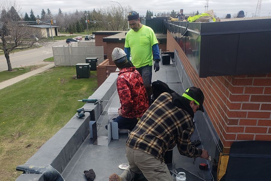 Air Force Base 292 in Minot, North Dakota, with our crew installing a new flashing detail and scupper.