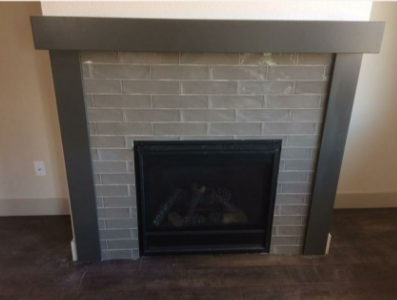 There is a fireplace in the middle of the room.